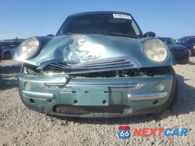 Piąte zdjęcie samochodu w środku: 2002 MINI COOPER VIN:WMWRC33442TE12938 - miniatura