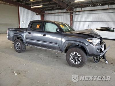 Czwarte zdjęcie samochodu z boku: 2023 TOYOTA TACOMA DOUBLE CAB VIN:3TMCZ5AN2PM595676 - miniatura
