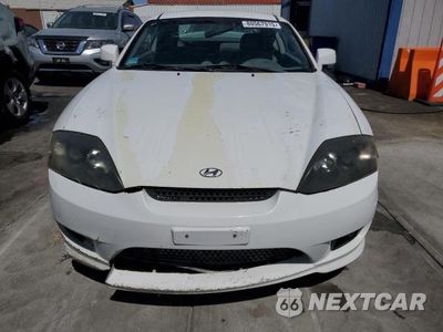 Piąte zdjęcie samochodu w środku: 2005 HYUNDAI TIBURON VIN:KMHHN65F25U168299 - miniatura