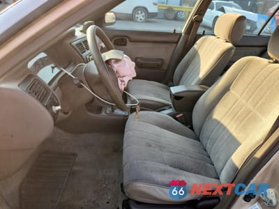 Zdjęcie 7 z 15 samochodu: 1996 TOYOTA COROLLA VIN:1NXBA02E7TZ426176 - miniatura