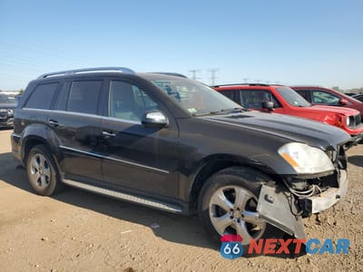 Czwarte zdjęcie samochodu z boku: 2010 MERCEDES-BENZ GL 450 4MATIC VIN:4JGBF7BE2AA611874 - miniatura