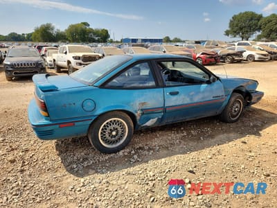 Trzecie zdjęcie samochodu z tyłu: 1994 PONTIAC SUNBIRD LE VIN:1G2JB14T4R7546107 - miniatura
