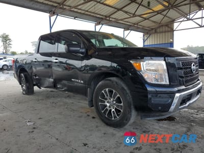 Czwarte zdjęcie samochodu z boku: 2021 NISSAN TITAN SV VIN:1N6AA1ED3MN524834 - miniatura