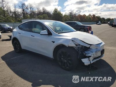 Czwarte zdjęcie samochodu z boku: 2022 TESLA MODEL Y VIN:7SAYGDEE1NF565671 - miniatura