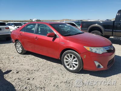 Czwarte zdjęcie samochodu z boku: 2014 TOYOTA CAMRY HYBRID VIN:4T1BD1FK0EU125510 - miniatura