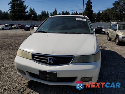 Piąte zdjęcie samochodu w środku: 2002 HONDA ODYSSEY EX VIN:2HKRL18672H536236 - miniatura