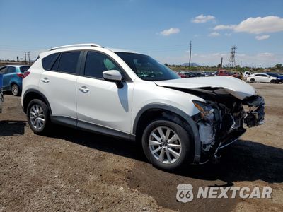 Czwarte zdjęcie samochodu z boku: 2016 MAZDA CX-5 TOURING VIN:JM3KE2CY0G0765878 - miniatura
