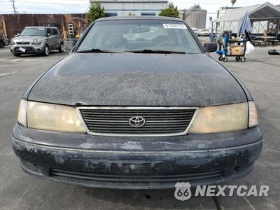 Piąte zdjęcie samochodu w środku: 1999 TOYOTA AVALON VIN:4T1BF18B3XU329096 - miniatura