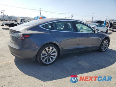 Trzecie zdjęcie samochodu z tyłu: 2018 TESLA MODEL 3 VIN:5YJ3E1EA3JF009462 - miniatura