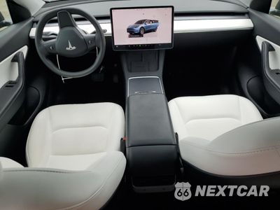 Zdjęcie 8 z 13 samochodu: 2022 TESLA MODEL Y VIN:7SAYGDEE8NF417629 - miniatura