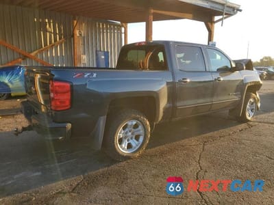 Trzecie zdjęcie samochodu z tyłu: 2018 CHEVROLET SILVERADO K1500 LT VIN:3GCUKREC3JG299046 - miniatura