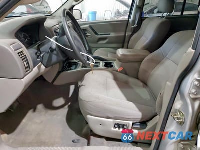 Zdjęcie 7 z 13 samochodu: 2004 JEEP GRAND CHEROKEE LAREDO VIN:1J4GX48S34C242206 - miniatura