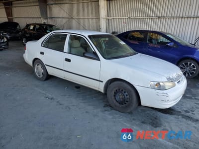 Czwarte zdjęcie samochodu z boku: 1999 TOYOTA COROLLA VE VIN:1NXBR12E0YZ326328 - miniatura