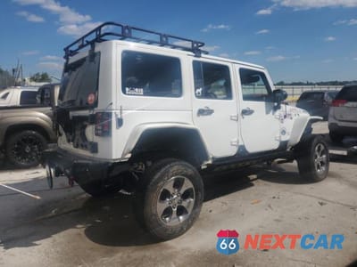 Trzecie zdjęcie samochodu z tyłu: 2016 JEEP WRANGLER UNLIMITED SAHARA VIN:1C4BJWEG2GL304390 - miniatura