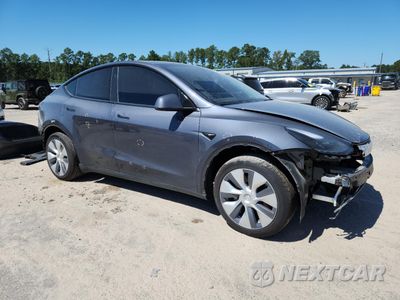 Czwarte zdjęcie samochodu z boku: 2023 TESLA MODEL Y VIN:7SAYGDEE7PF926341 - miniatura