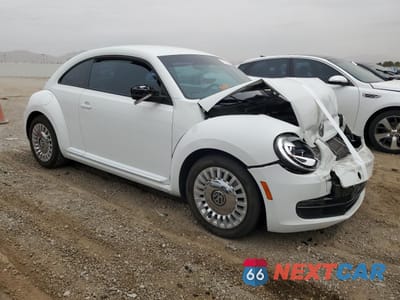 Czwarte zdjęcie samochodu z boku: 2016 VOLKSWAGEN BEETLE SE VIN:3VWJ17AT8GM633689 - miniatura