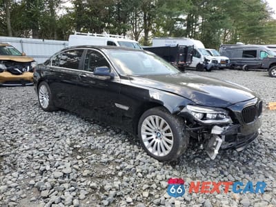 Czwarte zdjęcie samochodu z boku: 2011 BMW 750 LXI VIN:WBAKC8C52BC434117 - miniatura