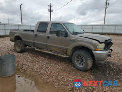 Czwarte zdjęcie samochodu z boku: 2002 FORD F 350 VIN:1FTSW31F12ED54403 - miniatura