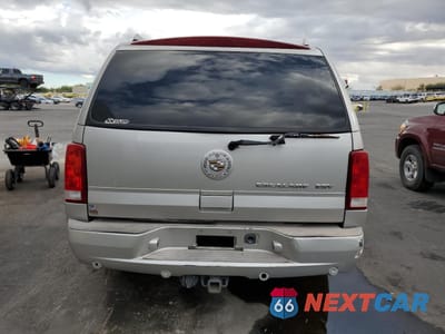 Zdjęcie 6 z 13 samochodu: 2004 CADILLAC ESCALADE ESV VIN:3GYFK66N14G247145 - miniatura