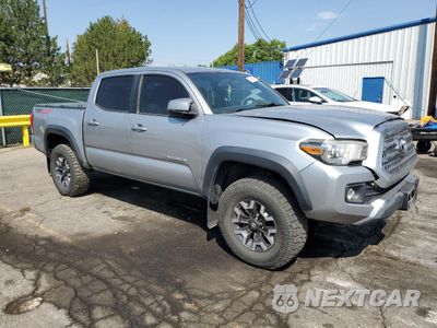 Czwarte zdjęcie samochodu z boku: 2017 TOYOTA TACOMA DOUBLE CAB VIN:3TMCZ5AN9HM100035 - miniatura