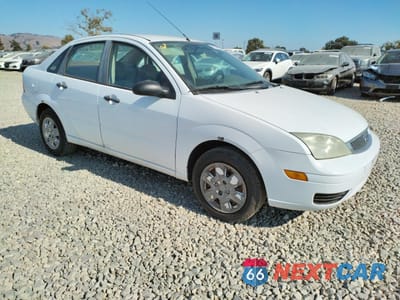 Czwarte zdjęcie samochodu z boku: 2007 FORD FOCUS ZX4 VIN:1FAHP34N07W232889 - miniatura