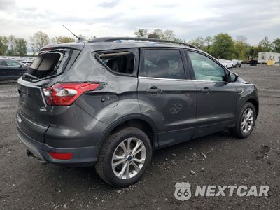 Trzecie zdjęcie samochodu z tyłu: 2019 FORD ESCAPE SEL VIN:1FMCU9HDXKUA84848 - miniatura