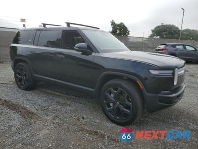 Czwarte zdjęcie samochodu z boku: 2025 RIVIAN R1S ADVENTURE VIN:7PDSGBBAXSN068925 - miniatura