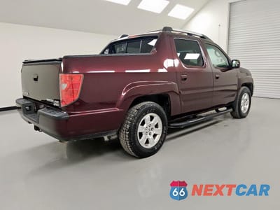 Trzecie zdjęcie samochodu z tyłu: 2011 HONDA RIDGELINE RTS VIN:5FPYK1F47BB006354 - miniatura
