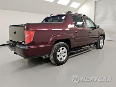 Trzecie zdjęcie samochodu z tyłu: 2011 HONDA RIDGELINE RTS VIN:5FPYK1F47BB006354 - miniatura