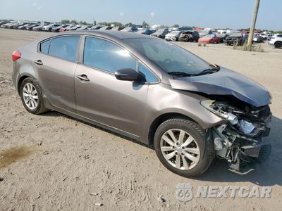 Czwarte zdjęcie samochodu z boku: 2014 KIA FORTE LX VIN:KNAFX4A69E5149837 - miniatura