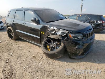 Czwarte zdjęcie samochodu z boku: 2018 JEEP GRAND CHEROKEE TRACKHAWK VIN:1C4RJFN92JC198708 - miniatura