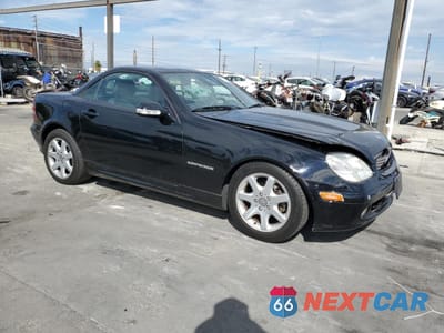 Czwarte zdjęcie samochodu z boku: 2002 MERCEDES-BENZ SLK 230 KOMPRESSOR VIN:WDBKK49F82F266754 - miniatura