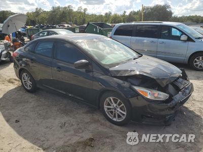 Czwarte zdjęcie samochodu z boku: 2018 FORD FOCUS SE VIN:1FADP3F27JL319473 - miniatura