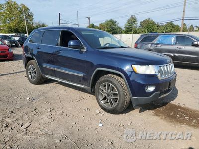 Czwarte zdjęcie samochodu z boku: 2012 JEEP GRAND CHEROKEE LAREDO VIN:1C4RJFAG1CC263703 - miniatura