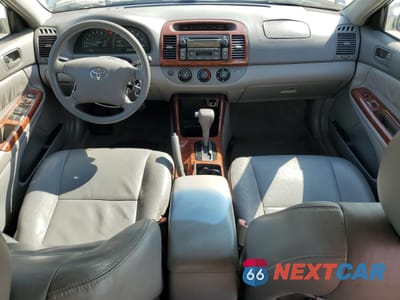 Zdjęcie 8 z 14 samochodu: 2004 TOYOTA CAMRY LE VIN:4T1BF32K84U569518 - miniatura