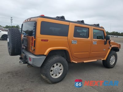 Trzecie zdjęcie samochodu z tyłu: 2006 HUMMER H2 VIN:5GRGN23U76H116170 - miniatura