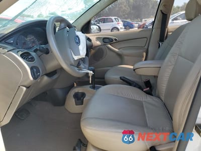 Zdjęcie 7 z 14 samochodu: 2003 FORD FOCUS ZTS VIN:1FAFP38353W265056 - miniatura