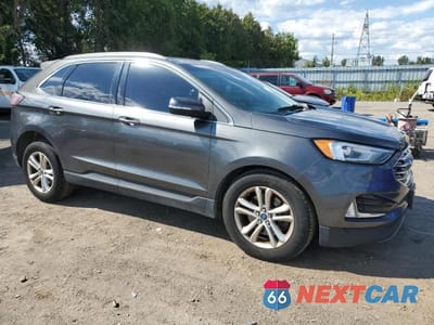 Czwarte zdjęcie samochodu z boku: 2019 FORD EDGE SEL VIN:2FMPK4J9XKBB29180 - miniatura