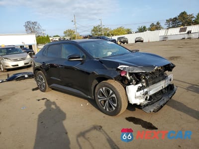 Czwarte zdjęcie samochodu z boku: 2023 TOYOTA BZ4X XLE VIN:JTMABACA8PA026438 - miniatura