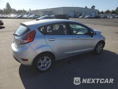 Trzecie zdjęcie samochodu z tyłu: 2016 FORD FIESTA SE VIN:3FADP4EJ8GM160209 - miniatura