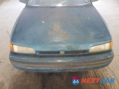 Zdjęcie 11 z 11 samochodu: 1994 MAZDA PROTEGE DX VIN:JM1BG2248R0778768 - miniatura