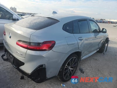 Trzecie zdjęcie samochodu z tyłu: 2022 BMW X4 XDRIVE30I VIN:5UX33DT05N9K58717 - miniatura