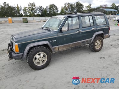 1992 JEEP CHEROKEE LAREDO 1J4FJ58S5NL200771 - główne zdjęcie licytacji z USA - miniatura