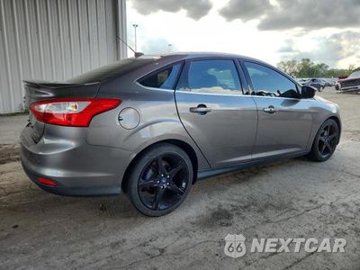 Trzecie zdjęcie samochodu z tyłu: 2013 FORD FOCUS TITANIUM VIN:1FADP3J25DL363080 - miniatura