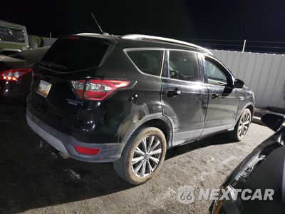 Trzecie zdjęcie samochodu z tyłu: 2017 FORD ESCAPE TITANIUM VIN:1FMCU9J99HUE62219 - miniatura
