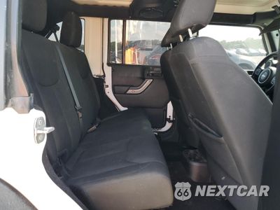 Zdjęcie 11 z 13 samochodu: 2014 JEEP WRANGLER UNLIMITED SPORT VIN:1C4BJWDG5EL304298 - miniatura