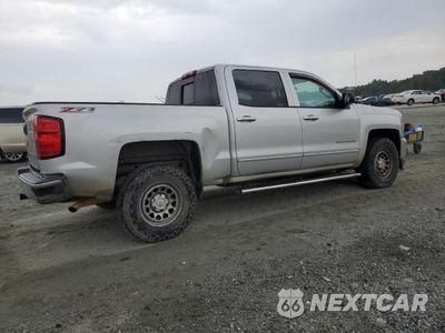 Trzecie zdjęcie samochodu z tyłu: 2017 CHEVROLET SILVERADO K1500 LT VIN:3GCUKREC5HG269041 - miniatura