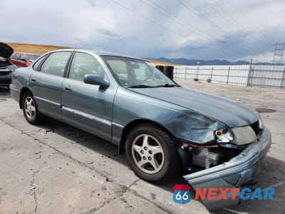 Czwarte zdjęcie samochodu z boku: 1999 TOYOTA AVALON XL VIN:4T1BF18B0XU328181 - miniatura