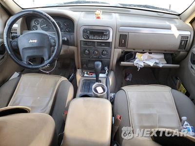 Zdjęcie 8 z 13 samochodu: 2004 JEEP GRAND CHEROKEE LAREDO VIN:1J4GX48S74C328411 - miniatura