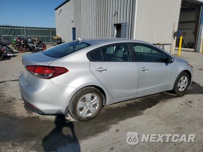 Trzecie zdjęcie samochodu z tyłu: 2017 KIA FORTE LX VIN:3KPFL4A79HE090921 - miniatura